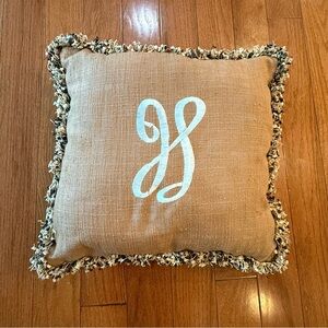 Tan Throw Pillow with Light Blue “H” Monogram Fringe Border